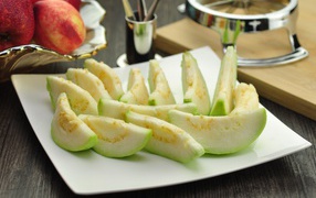 Guava fruit slices on white plate
