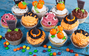 Cupcakes with cream and decorations for Halloween