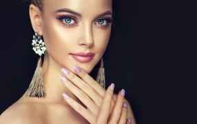 Beautiful girl with big blue eyes and beautiful nails