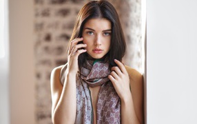 Beautiful young girl with a scarf around his neck