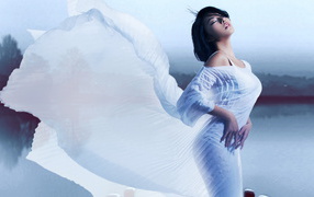 Stylish asian girl in a beautiful white dress