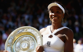American tennis player Venus Williams with a reward on the court