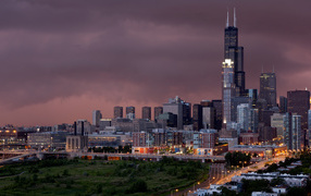 View of night Chicago under a cloudy sky, USA
