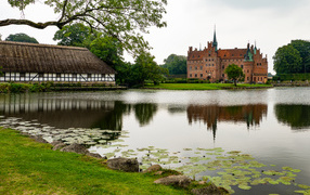 Egeshkov Castle by the pond, Denmark