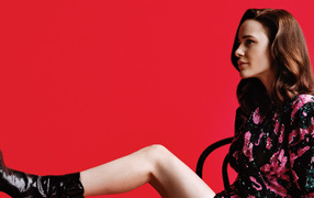 Actress Rachel Brosnahan on a red background