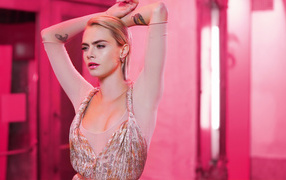 Beautiful girl actress Cara Delevingne on a pink background