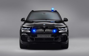 Black car BMW X5 Protection VR6 2019 on a gray background front view