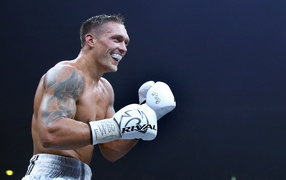 Boxer Alexander Usik on gloves in the ring