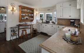 Bright kitchen with a set and carpet