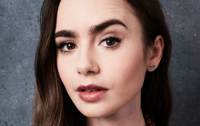 Brown-eyed girl, actress Lily Collins close-up