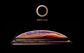 The new iPhone XS and Apple's iPhone XS Plus on a black background