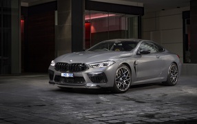 2020 silver BMW M8 Competition Coupe at the building