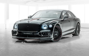 Черный автомобиль Mansory Bentley Flying Spur 2020 года на белом фоне