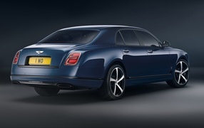 Stylish 2020 Bentley Mulsanne Edition By Mulliner rear view on a gray background