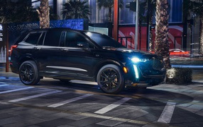 2020 big black Cadillac XT6 Midnight Edition on the night street