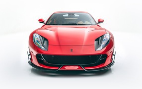 Красный автомобиль Mansory Ferrari 812,  2020 года на белом фоне