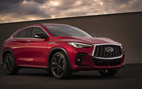 2022 Infiniti QX55 AWD red car against the wall
