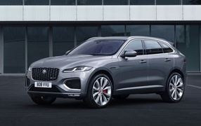 2020 Jaguar F-Pace R-Dynamic silver car in front of the building