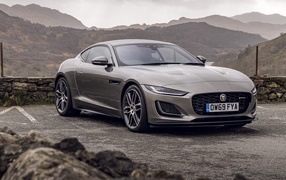 Expensive car Jaguar F-Type P450 R-Dynamic 2020 on a background of mountains