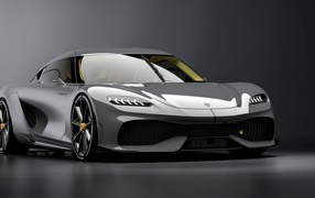 Быстрый автомобиль Koenigsegg Gemera 2020 года на сером фоне