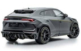 Серый внедорожник Lamborghini Urus 2019 года на белом фоне