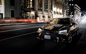 2020 black car Lexus GS 350 Eternal Touring on a city street at night