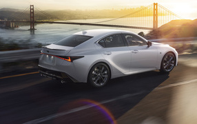 White Lexus IS 350 F SPORT 2021 on the road by the ocean