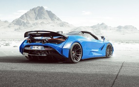 Blue McLaren 720S Spider N-Largo 2020 car rear view against the backdrop of the mountains