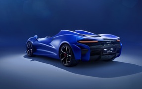 Blue car McLaren Elva, 2020 on a blue background