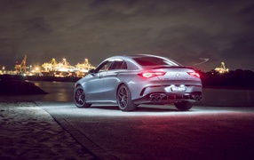 Car Mercedes-AMG CLA 45 S 4MATIC, 2020 against the backdrop of the city