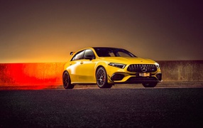 Yellow car Mercedes-AMG A 45 S, 2020 on the pavement
