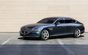 Автомобиль Genesis G80 AWD 2020 года у стены