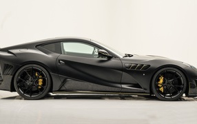 Черный автомобиль Mansory Stallone вид сбоку 