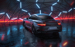 Серебристый автомобиль Porsche 911 Turbo S 