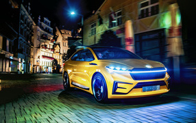2019 yellow Skoda Vision IV car on a city street