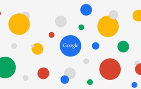 Надпись google на белом фоне с разноцветными кругами