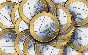 Many one euro coins close up