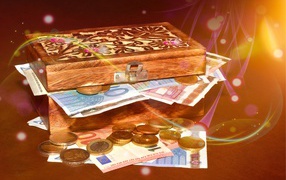 Деревянный сундук с деньгами и монетами
