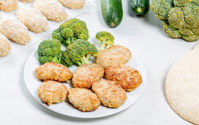 Delicious meatballs on a plate with broccoli