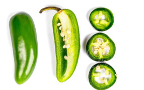 Green pepper cut on white background