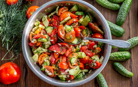 Spring salad with tomatoes and cucumbers