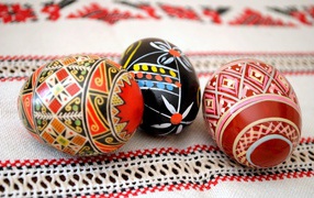 Beautiful hand-painted eggs on a towel on a bright Sunday of Christ