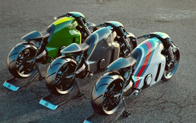 Three Lotus C01 motorcycles on the pavement