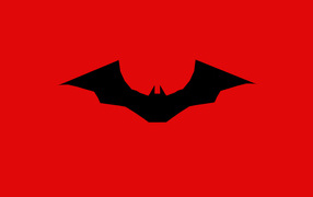 Логотип нового фильма Бэтмен на красном фоне