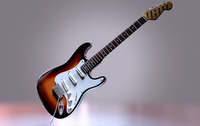 Красивая электрогитара на сером фоне