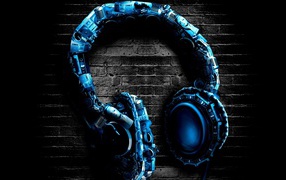 Синие стильные наушники на кирпичном фоне
