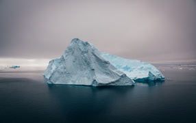 Big blue iceberg in the ocean