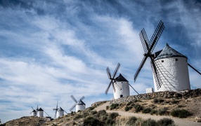 Many windmills under the blue sky