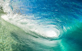Big wave for surfing in the blue ocean
