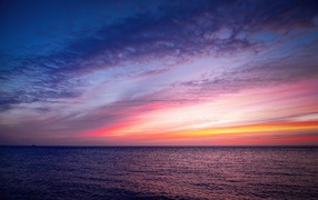 Endless calm sea at sunset